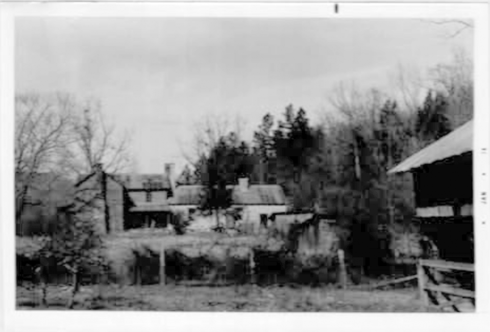 I brightened the low-resolution image of the Doran house from the application PDF. The house is still difficult to see, but it's slightly more legible than the original. The 1974 photograph is credited to "Sorrells."